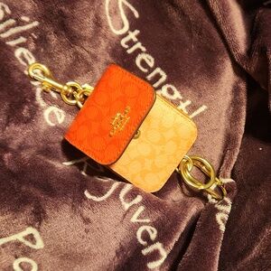 Coach Keychain/Earbud holder